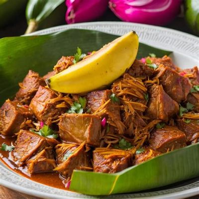  Cochinita Pibil:  Spice-Kissed Pork Indulgence Wrapped in Banana Leaves for an Earthy Aroma Explosion!