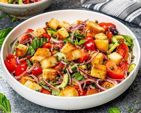   Panzanella: A Symphony of Tuscan Sun-Kissed Tomatoes and Crusty Bread Soaked in Zesty Vinaigrette!