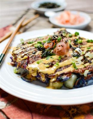  Okonomiyaki:  Savory Pancake Sensation Meets Umami-Rich Comfort Food Delight!